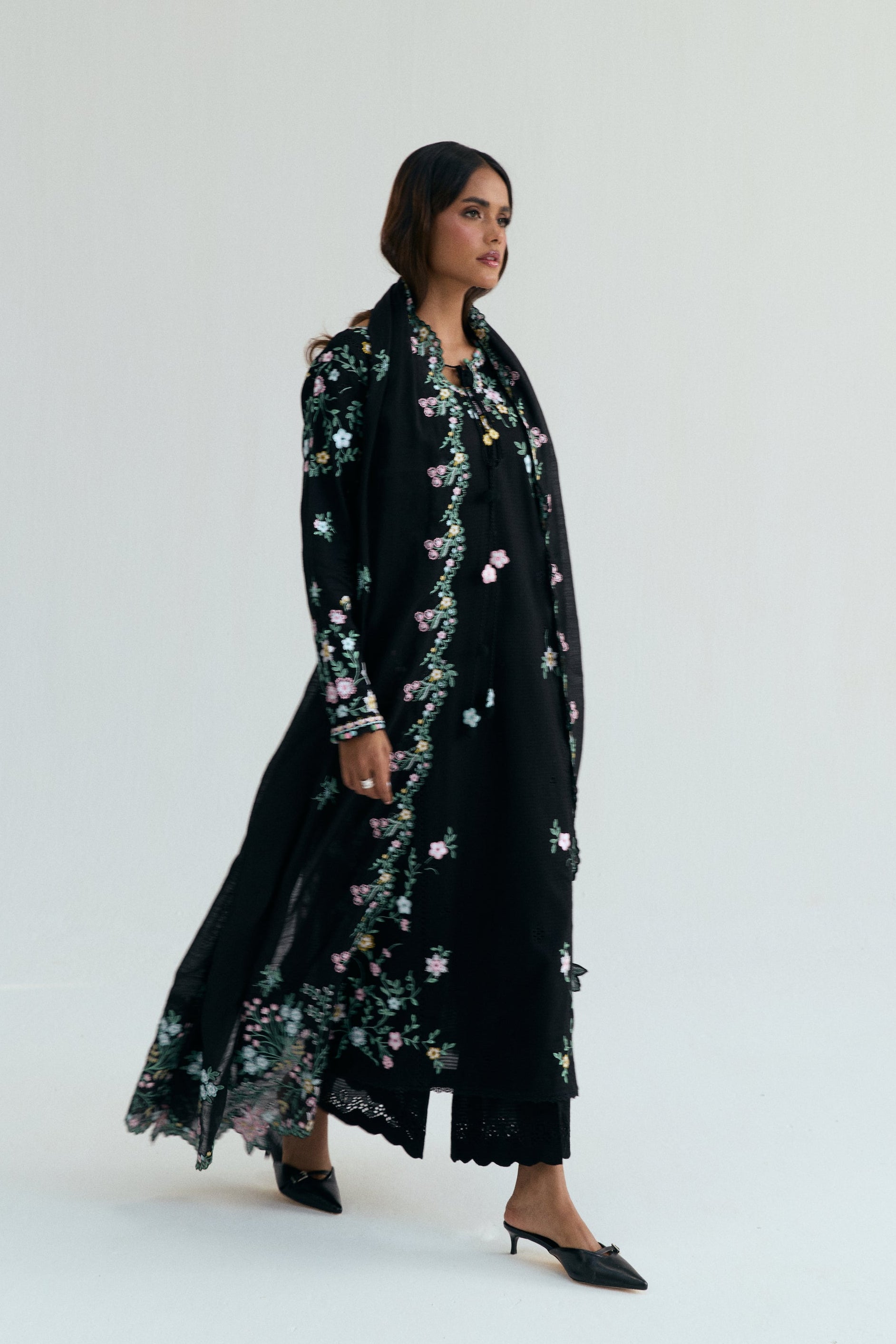  Black Pakistani casual outfit with floral embroidery, embroidered izaar trousers and scalloped dupatta. 