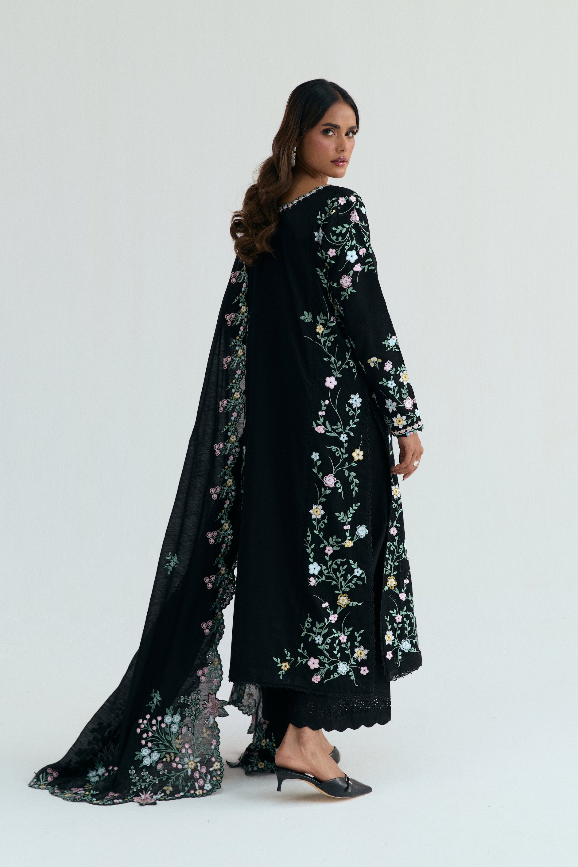  Black Pakistani casual outfit with floral embroidery, embroidered izaar trousers and scalloped dupatta. 