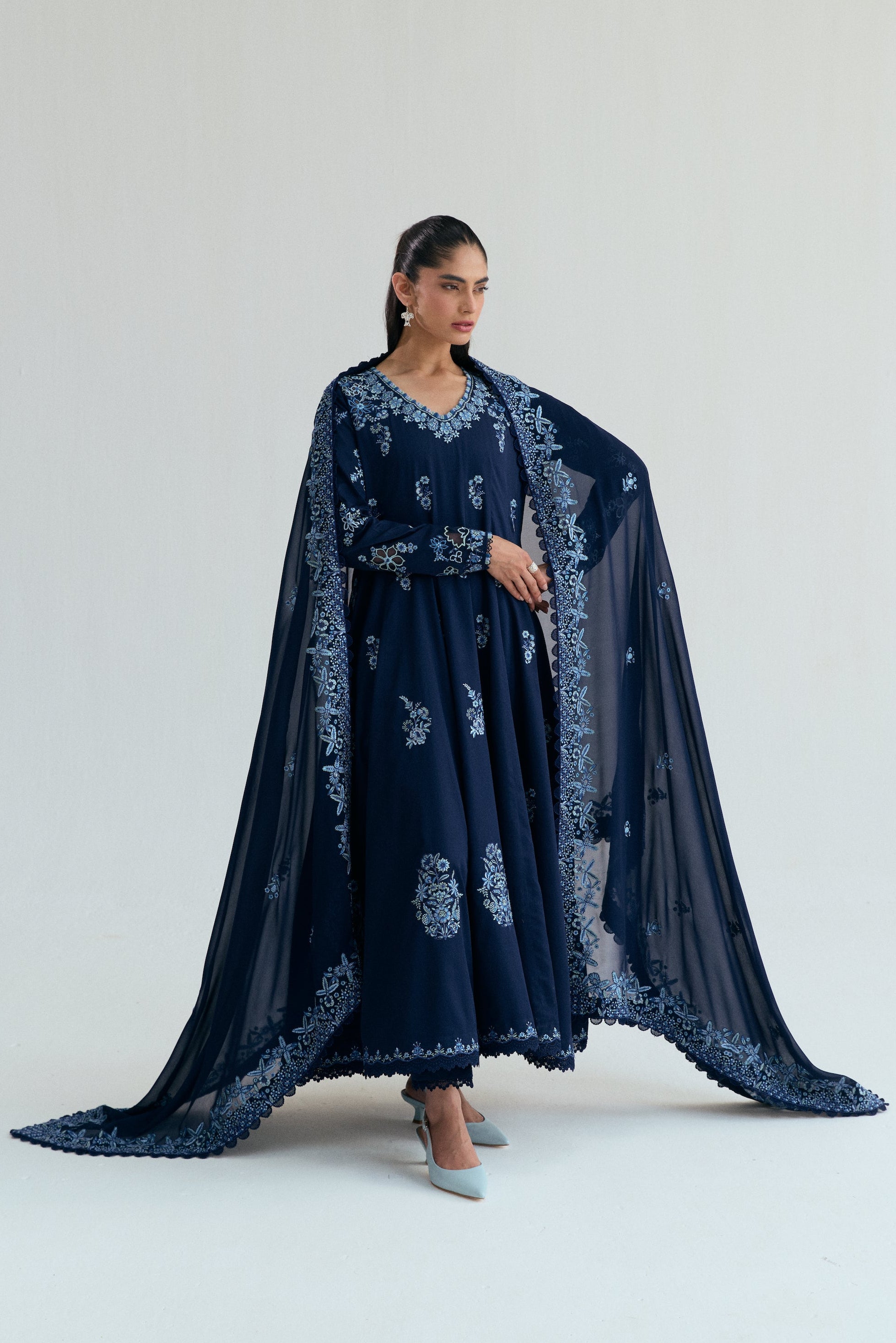 Embroidered Kalidaar frock with organza appliqué, lace-finished trousers and sequin chiffon dupatta. Ideal for Eid and festive occasions.