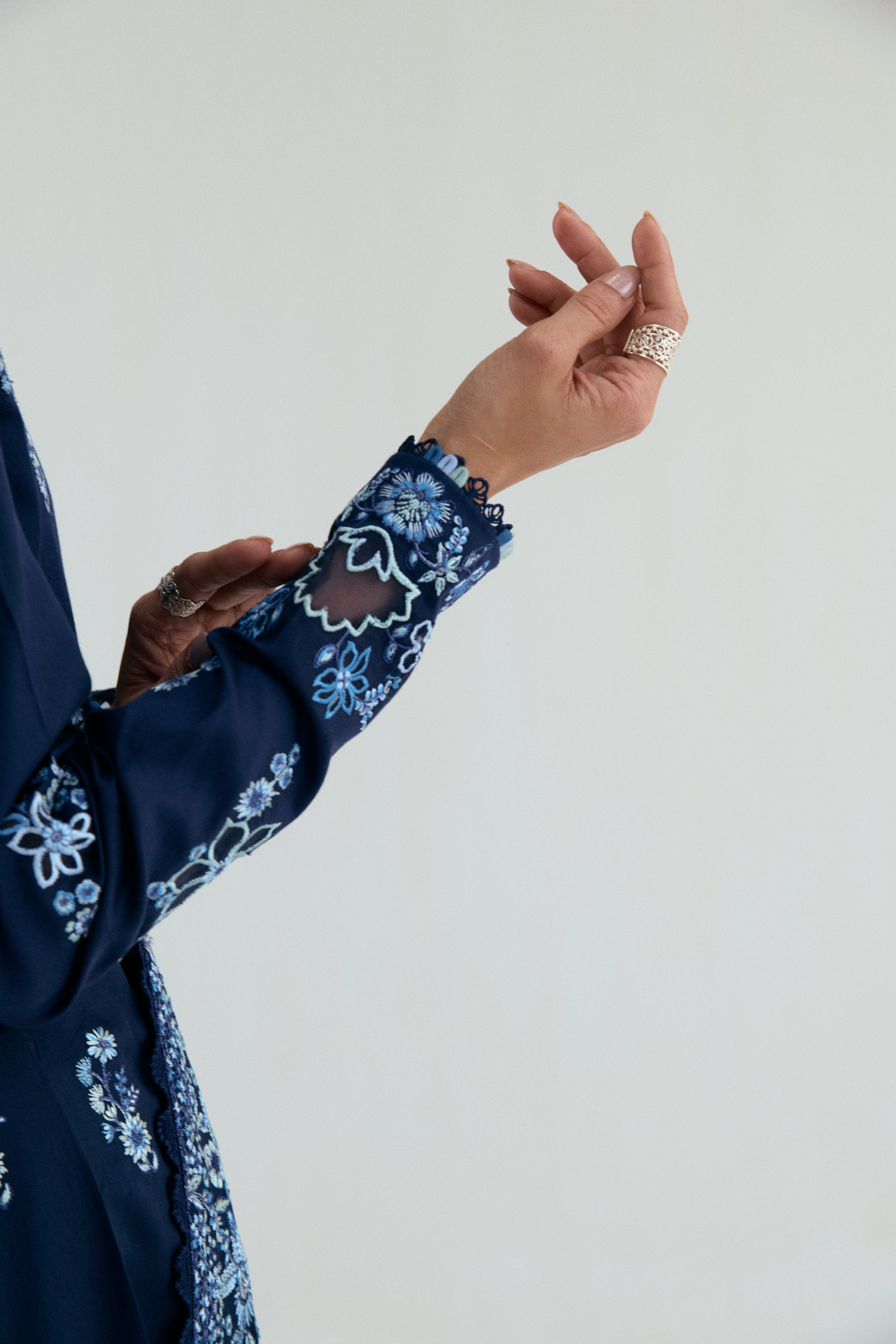 Embroidered Kalidaar frock with organza appliqué, lace-finished trousers and sequin chiffon dupatta. Ideal for Eid and festive occasions.