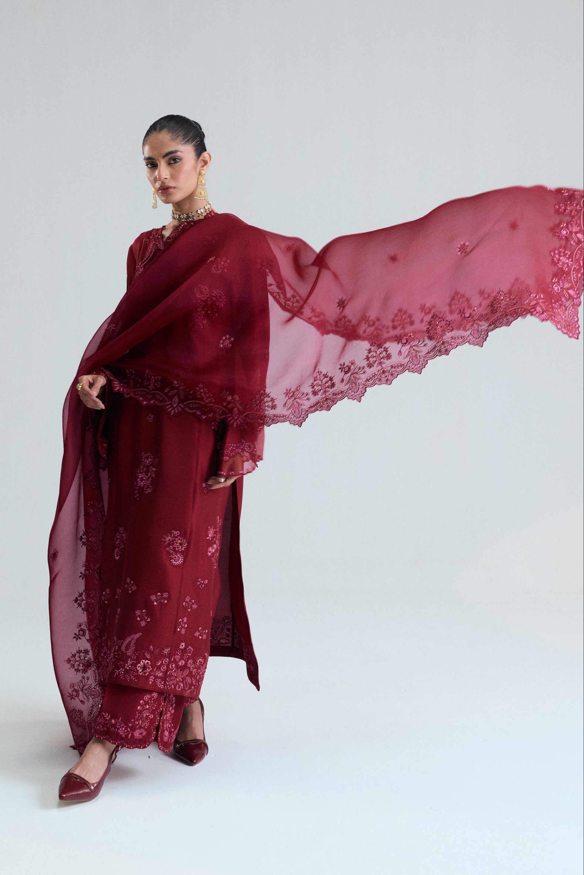 Maroon raw silk kameez with floral threadwork, sequins, beads and metallic accents