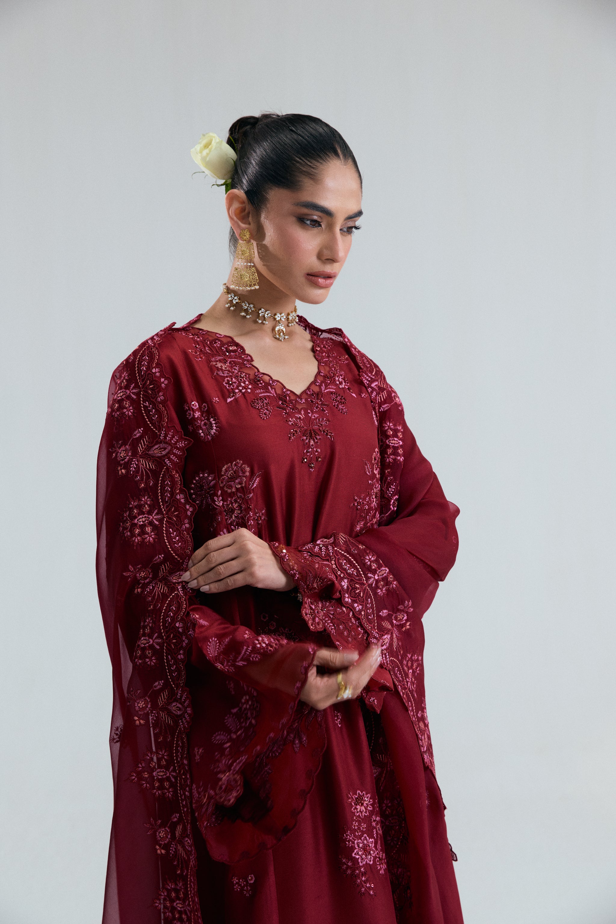 Maroon raw silk kameez with floral threadwork, sequins, beads and metallic accents