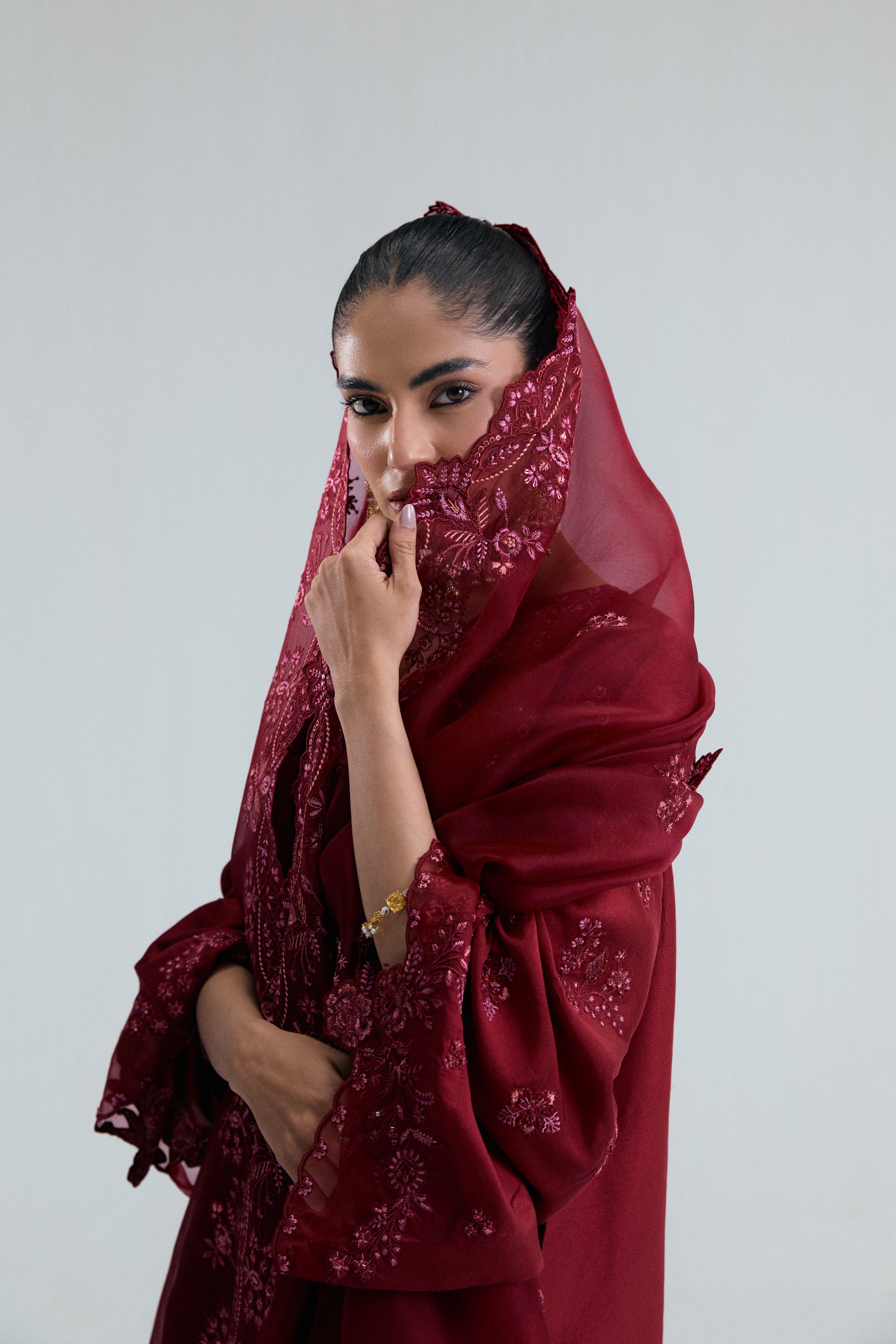 Maroon raw silk kameez with floral threadwork, sequins, beads and metallic accents