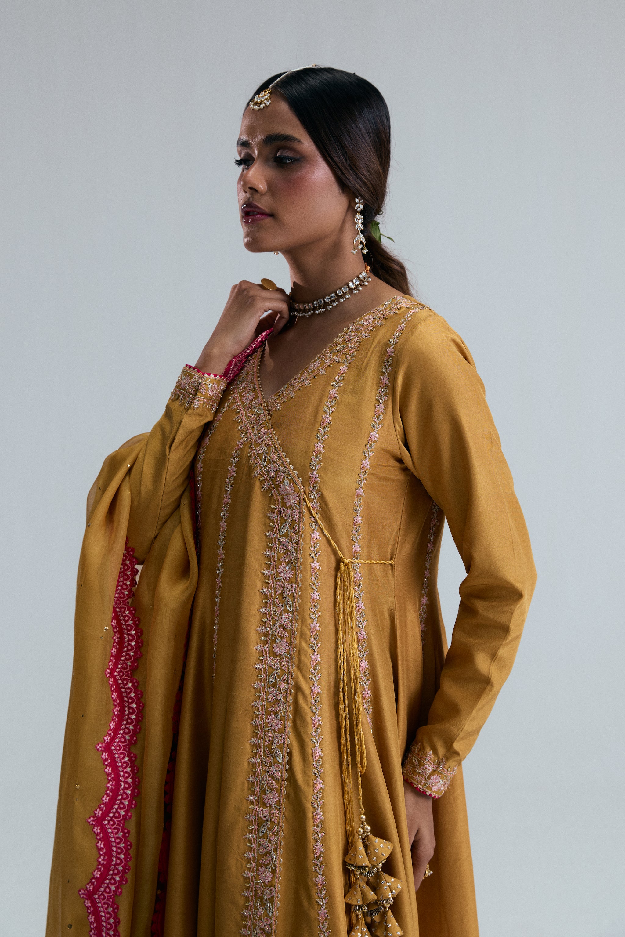 Pakistani formal wear Kalidaar Angrakha mustard yellow frock crafted in luxurious silk and organza