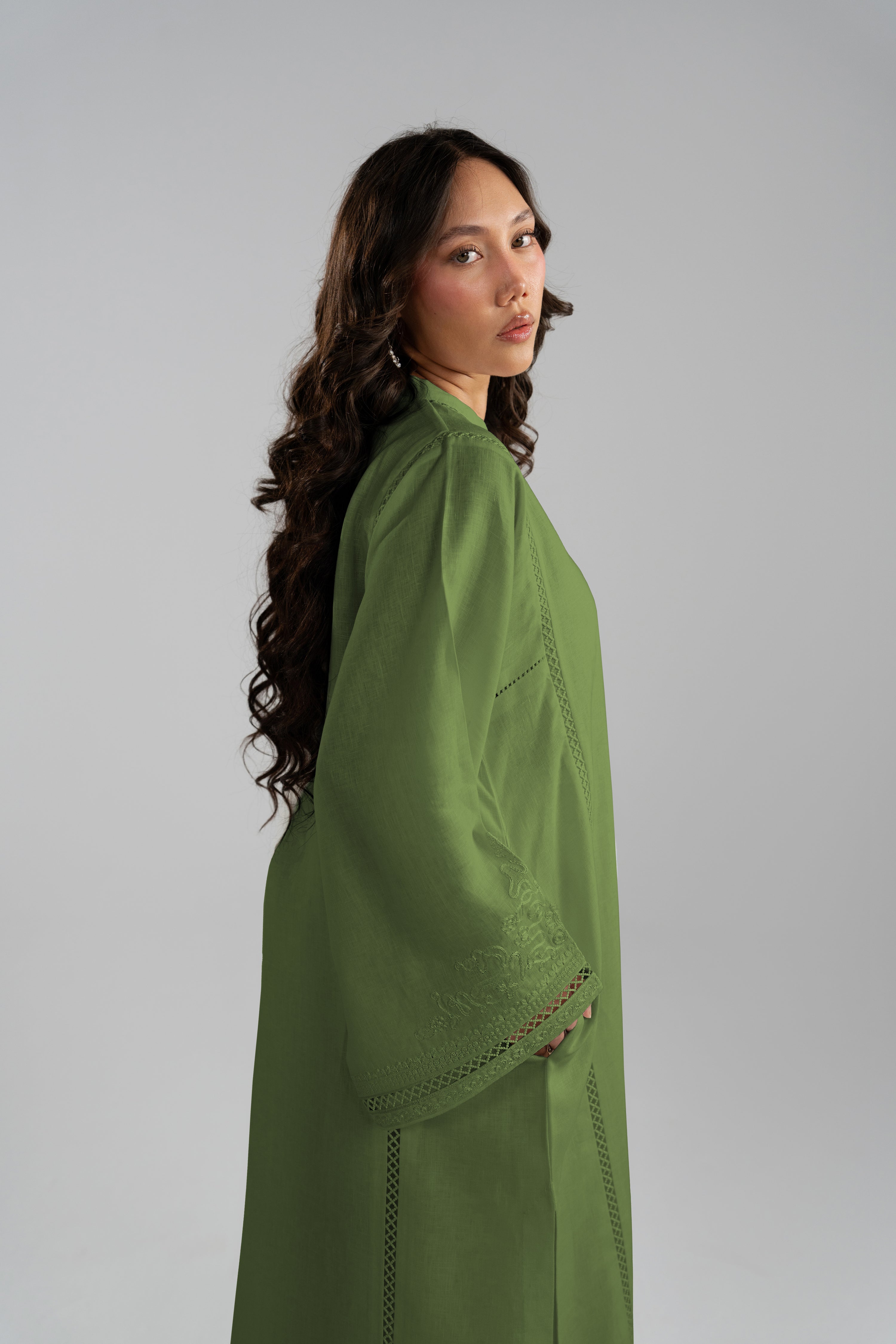 Side profile of the Clover Set's shoulder and sleeve drape