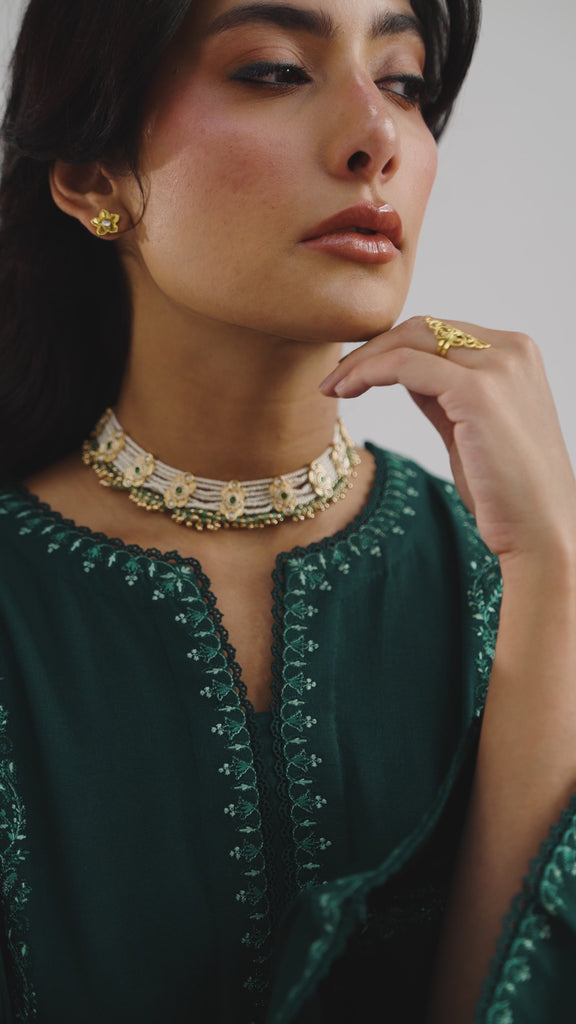 Premium emerald green Khaddar winter ensemble for women – embroidered kameez, farshi salwar, and detailed shawl for casual & semi-formal occasions