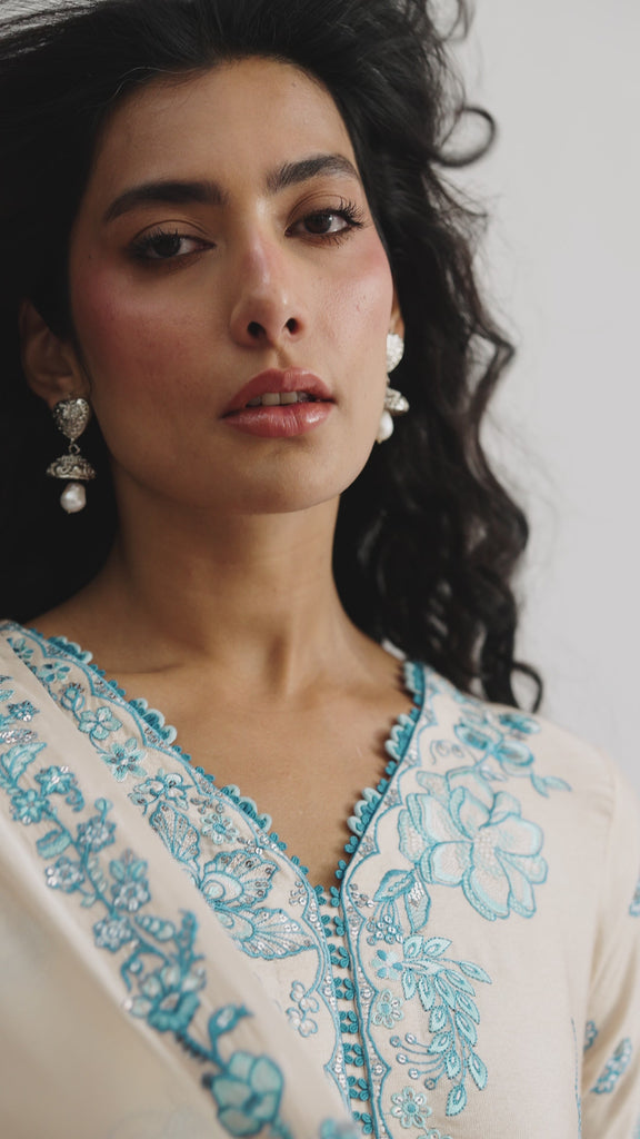 cream three piece pakistani kameez set with blue embroidery. Semi-formal wear. Pakistani silk outfit