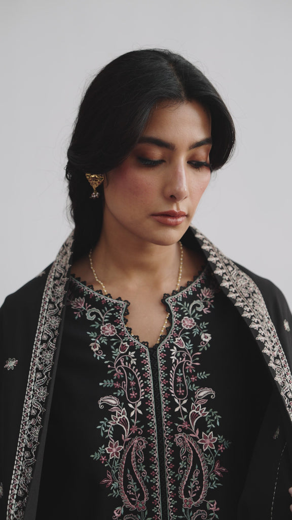 Premium black Khaddar winter ensemble for women – embroidered kameez, straight trousers, and detailed shawl for casual and semi-formal occasions