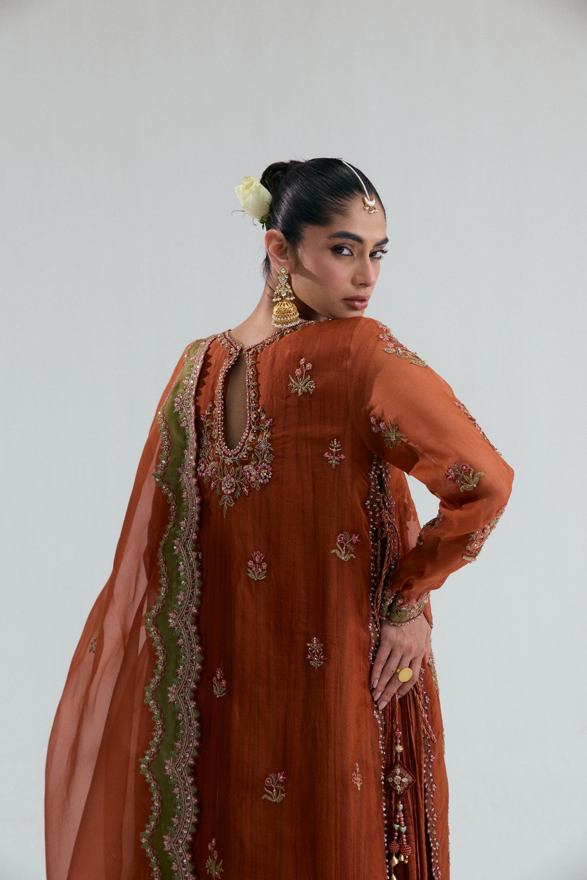 rust organza set, with floral embroidery running down the bodice