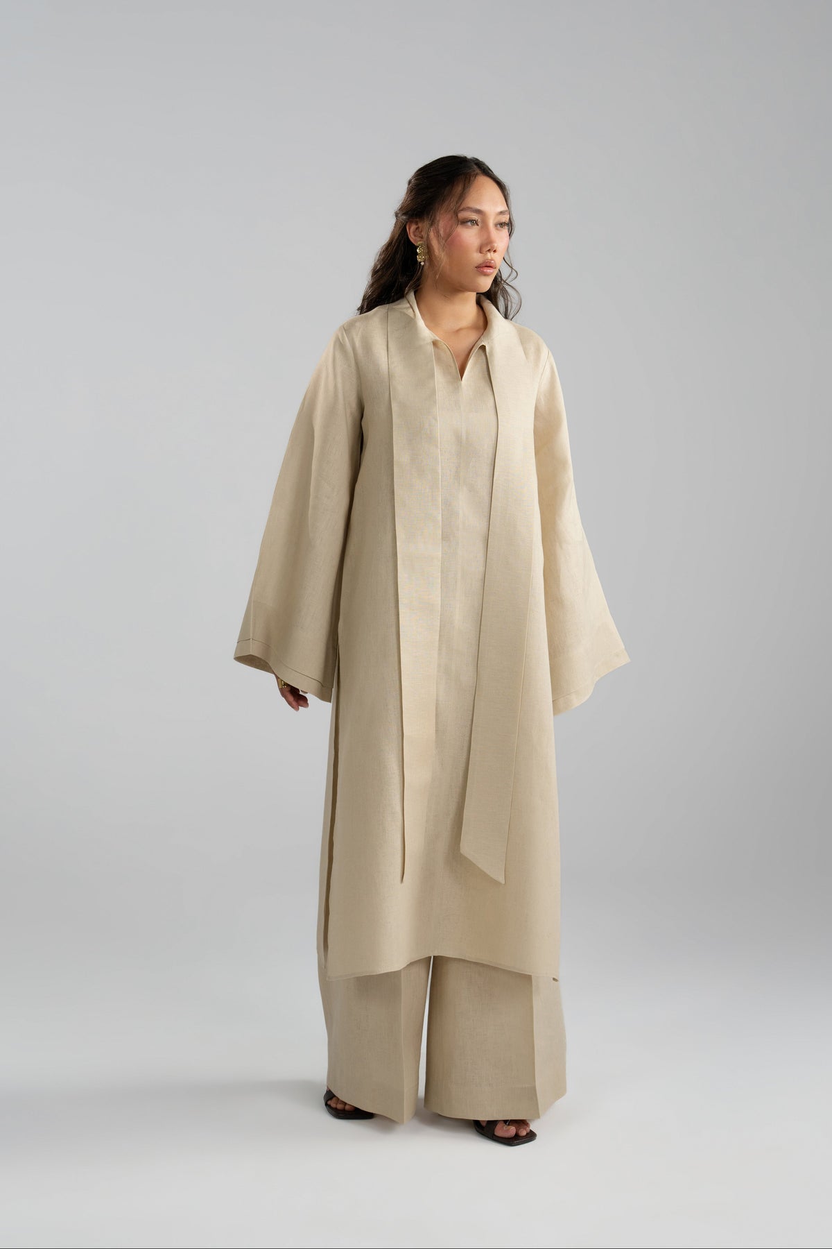 Mannam Sahara Set in beige linen — long tunic with attached scarf and wide-leg trousers, front view